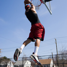 Man dunking a basketball